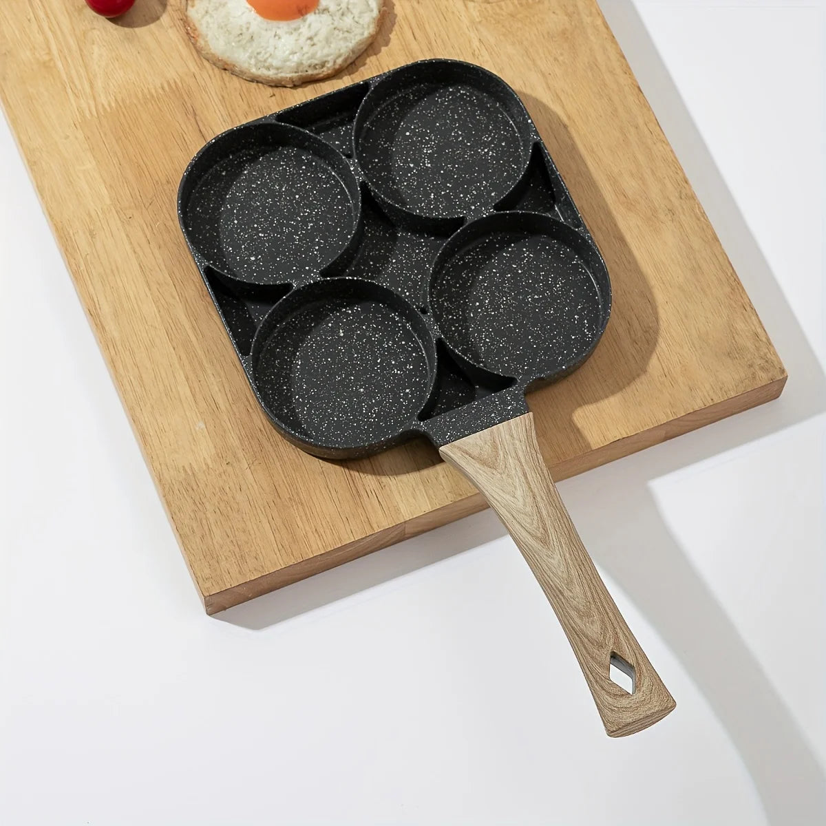 Vertex Select egg frying pan with 4-hole design, premium material, easy to cook, safe and healthy kitchenware for breakfast cooking.