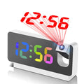 LOVOCK S282A digital alarm clock with projection, smart alarm, and snooze function on a bedside table.